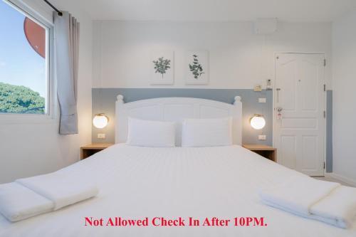 Baan Sutra Guesthouse - Tap to explore photos