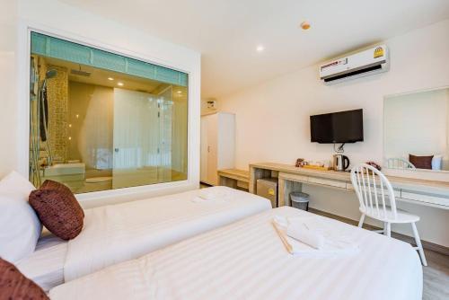 LullaBella Hotel Patong - Tap to explore photos