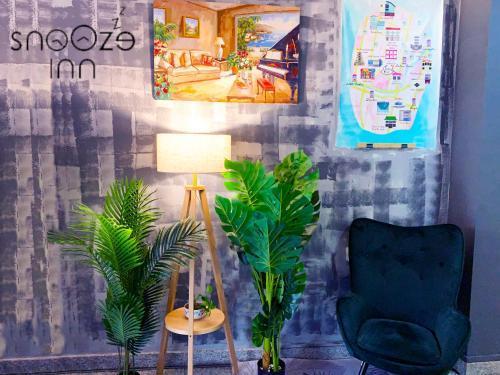 Snooze Inn Dickson Road - Hostel - Tap to explore photos