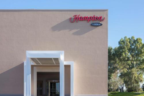 Hampton by Hilton Rome East - Tap to explore photos