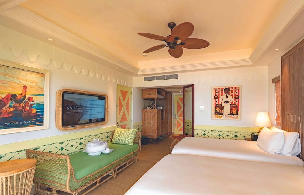 SAii Lagoon Maldives, Curio Collection by Hilton - Tap to explore photos