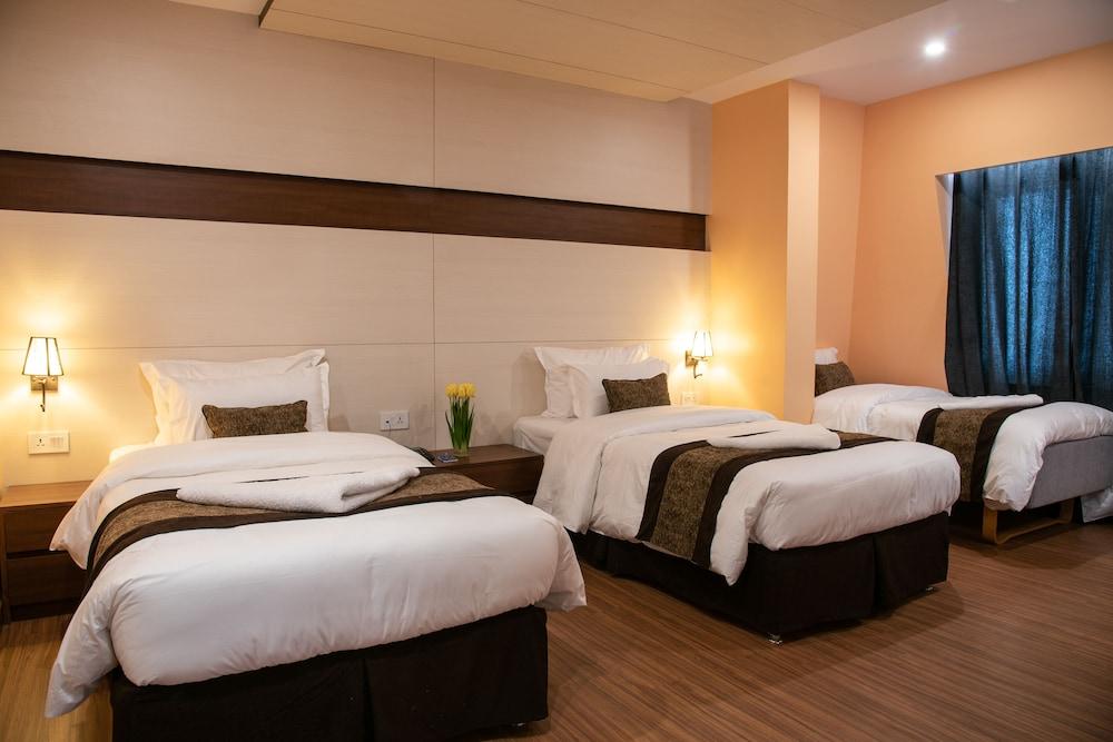 Sunshine Boutique Hotel Room Type - Deluxe Triple Room