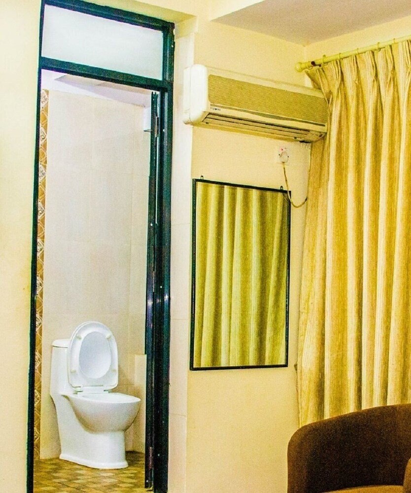 Hotel Om Ganapati - Tap to explore photos