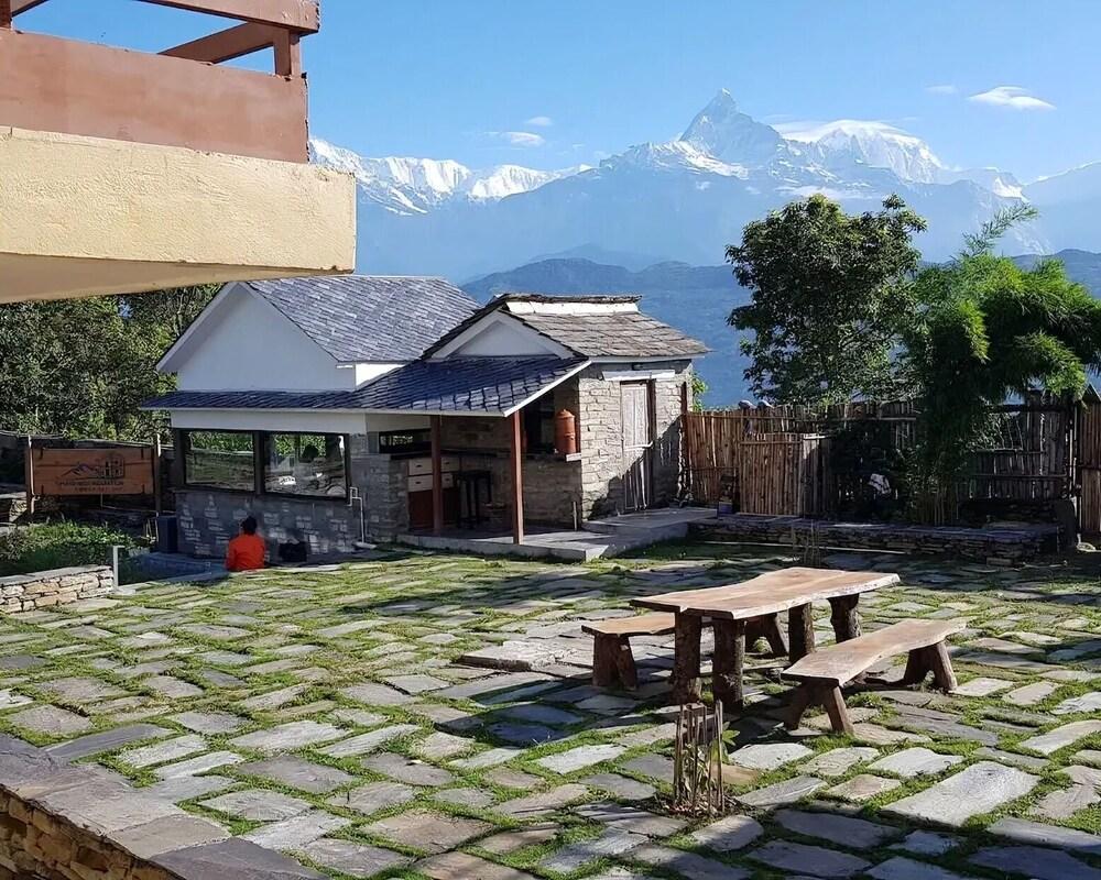 Pumdikot Mountain Lodge - Tap to explore photos