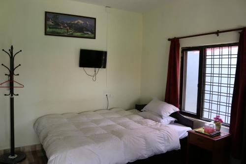 Gurkha Lodge - Tap to explore photos