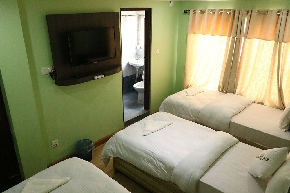 Hotel Samrajya Room Type - Basic Triple Room