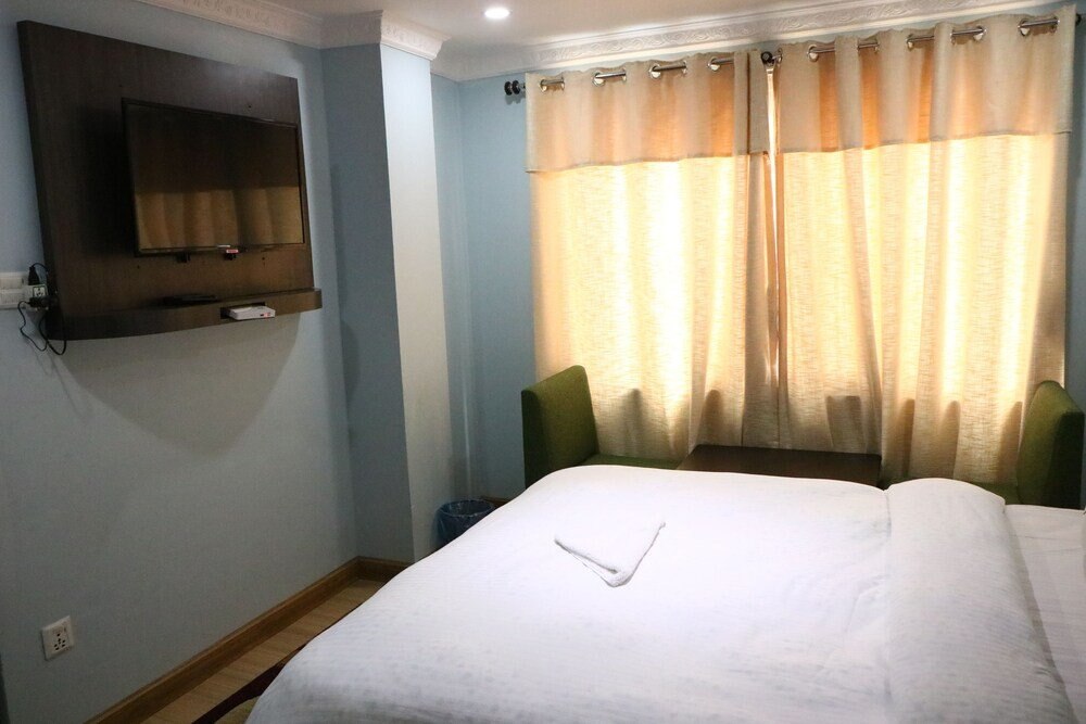 Hotel Samrajya Room Type - Deluxe Double Room