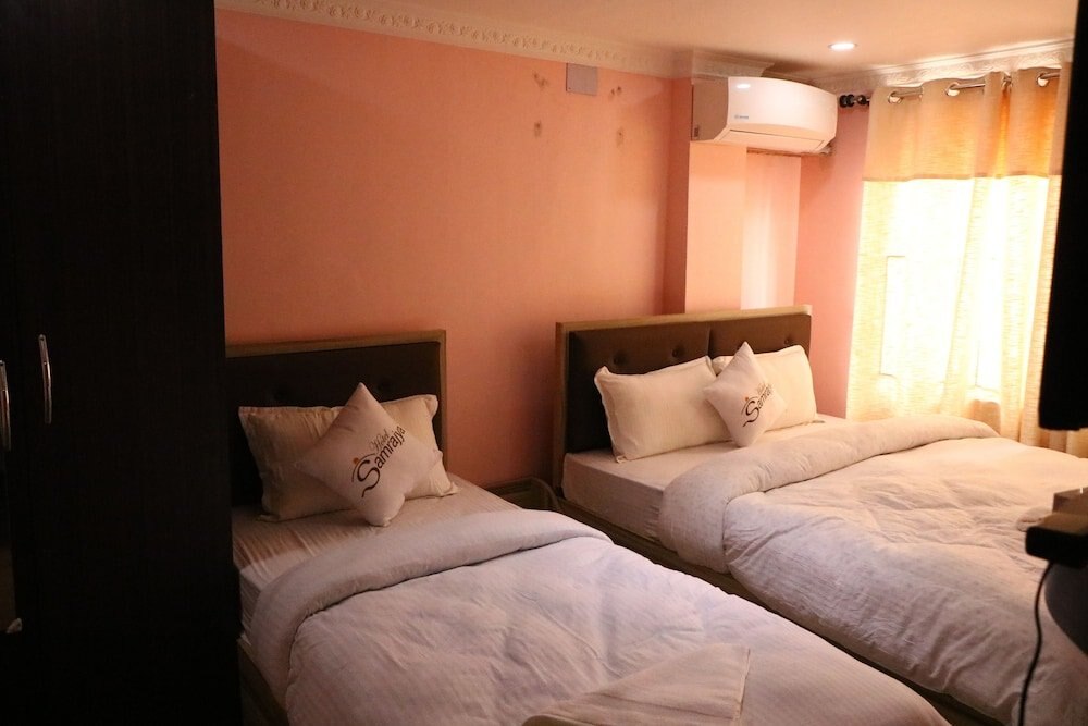 Hotel Samrajya Room Type - Deluxe Triple Room