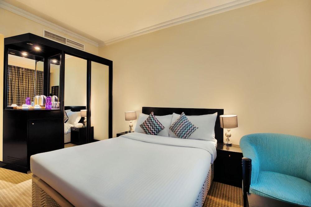 Swiss-Belinn Doha - Tap to explore photos
