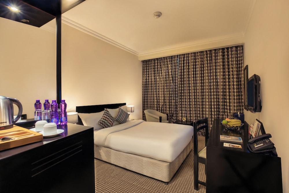 Swiss-Belinn Doha - Tap to explore photos