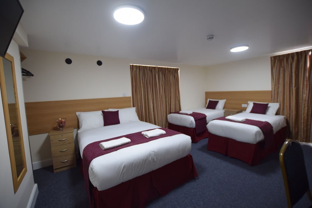 PremierLux Apartments Room Type - Standard Quadruple Room, 2 Double Beds, Non Smoking, City View