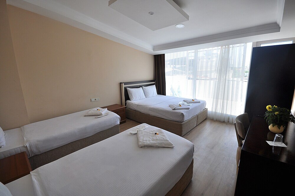 BAYKAL OTEL Room Type - Deluxe Quadruple Room, Balcony, Partial Sea View