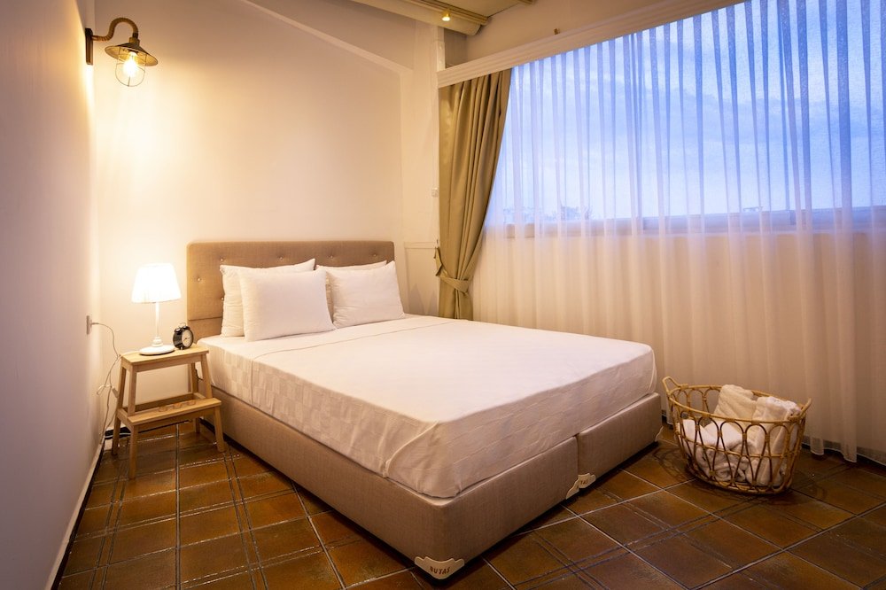 Guzi Rooms & Suites - Tap to explore photos