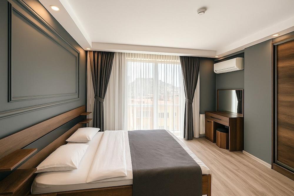 On4 Rooms & Suites - Tap to explore photos