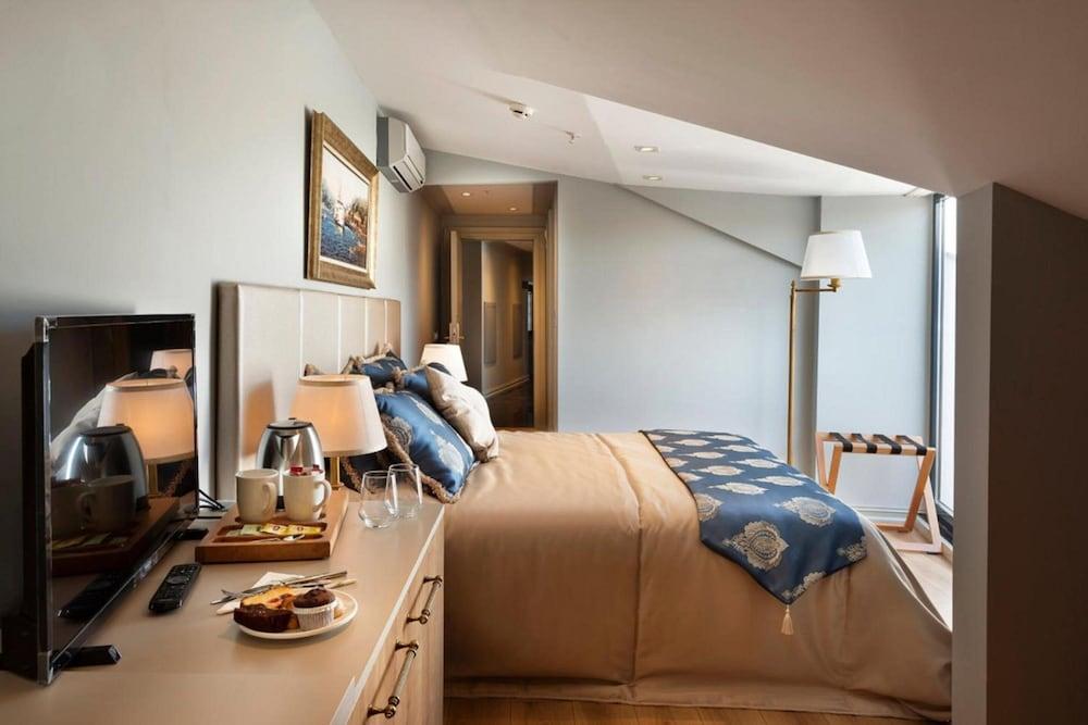 Guner Business Hotel Room Type - Family Room