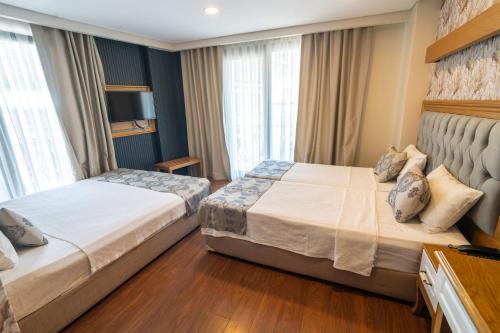 Eliza Hotel Room Type - Quadruple Room