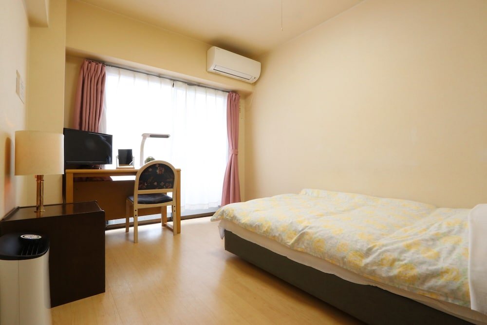Business Inn Grandeur Fuchu - Tap to explore photos