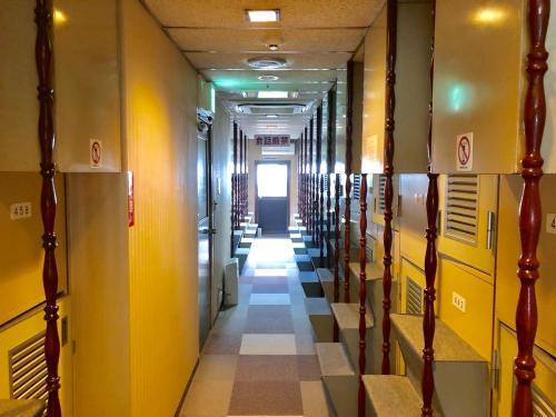 Capsule Hotel Block Room - Tap to explore photos