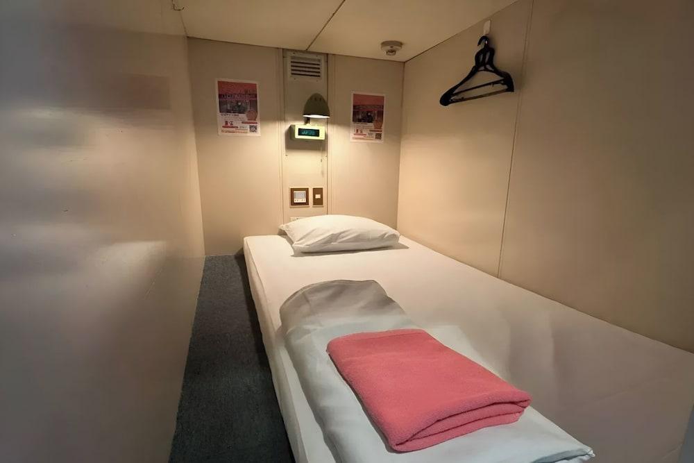Capsule Hotel Block Room - Tap to explore photos