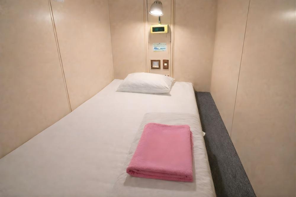 Capsule Hotel Block Room - Tap to explore photos
