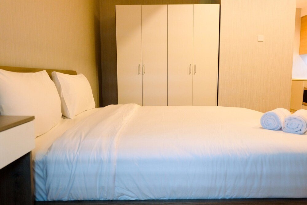 Homey Studio Room at Capitol Suites - Tap to explore photos