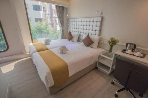 Justice Hotel Room Type - Standard Twin Room