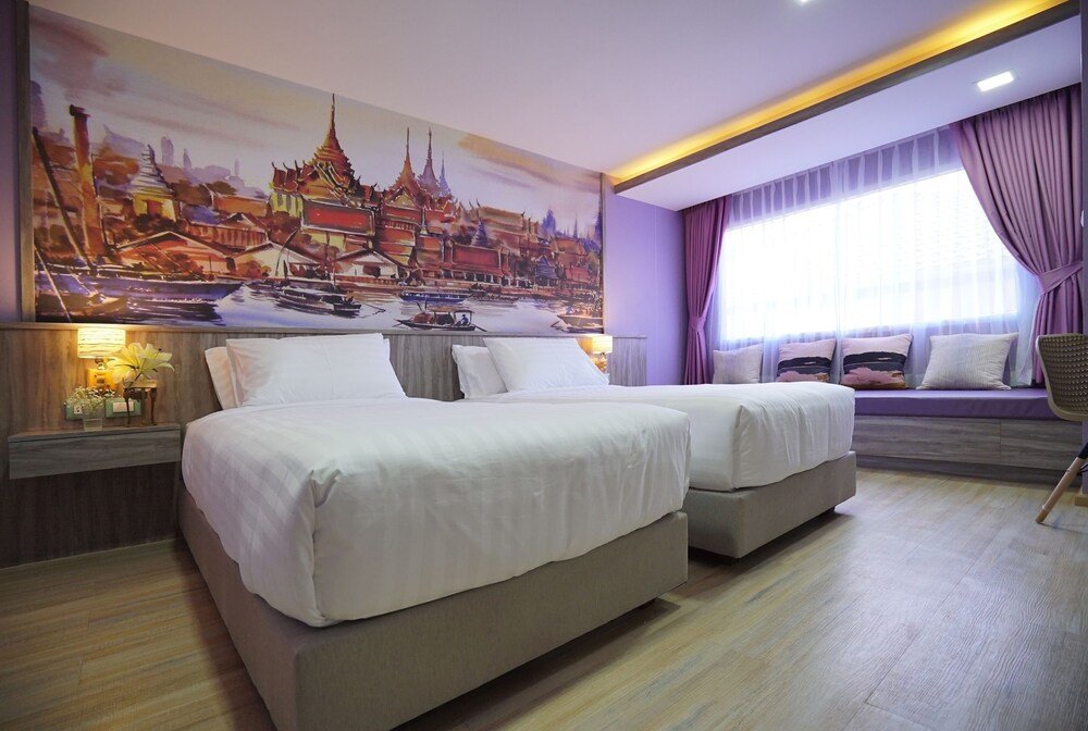 The Qube Fifty Hotel - Tap to explore photos