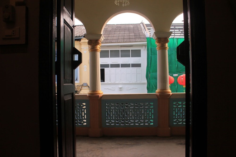 Thalang Guesthouse - Tap to explore photos