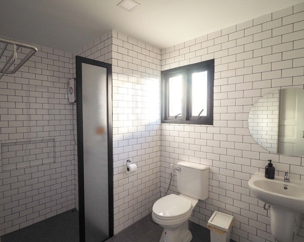 WIW Minihotel - Tap to explore photos