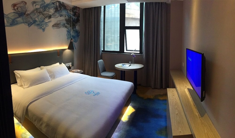 Lifu Hotel Shachong Metro Branch - Tap to explore photos