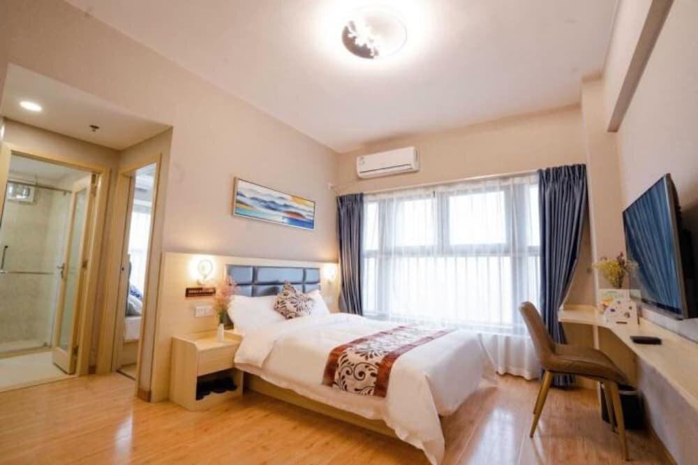 Yue Tu Apartment Hotel Room Type - Family Suite, Multiple Beds