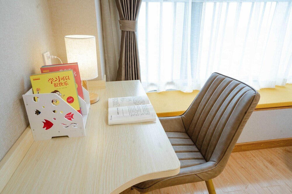 Yue Tu Apartment Hotel - Tap to explore photos