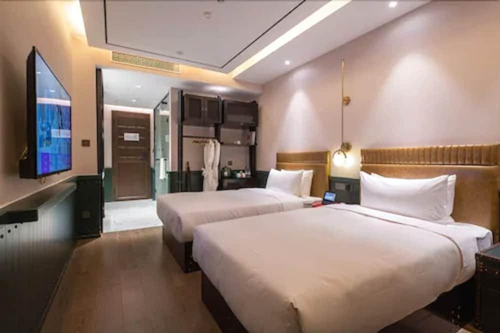 Manxin Hotel Yan'an West Road Branch - Tap to explore photos