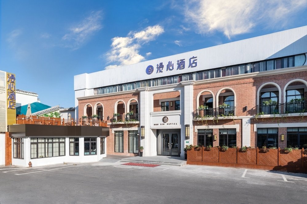 Manxin Hotel Yan'an West Road Branch - Tap to explore photos