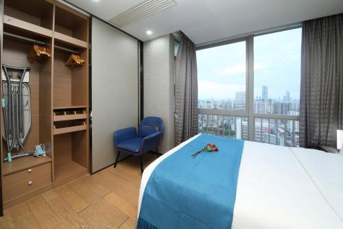 Pengman Beijing Road A-mall Apartment - Tap to explore photos