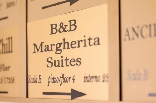 Margherita Suites - Tap to explore photos
