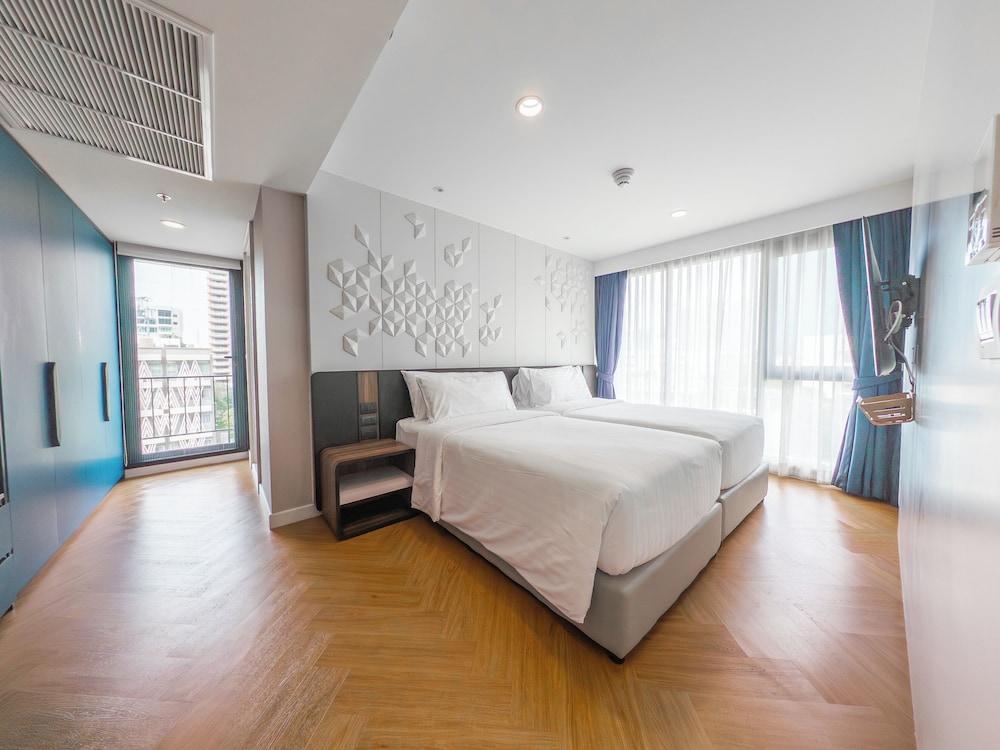Amanta Hotel & Residence Sathorn - Tap to explore photos
