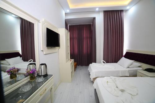 Taksim Diamond Hotel - Tap to explore photos
