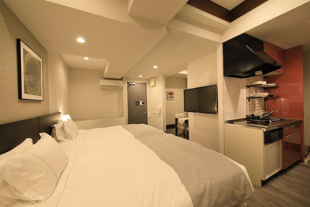 Centurion Hotel Residential Akasaka Room Type - Superior Twin Room - Two Double Beds - Non-Smoking, extra bed from 5th adult Centurion Hotel Residential Akasaka Room Type - Superior Twin Room - Two Double Beds - Non-Smoking, extra bed from 5th adult