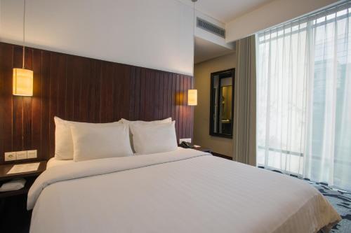 Liberty Hotel Thamrin Jakarta - Tap to explore photos