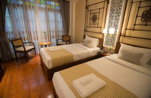 Woo Gallery and Boutique Hotel - Tap to explore photos