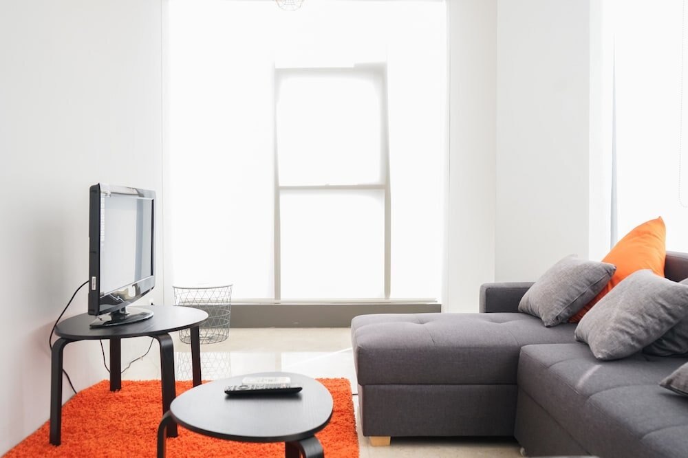 South Tower 2BR at L'Avenue Apartment - Tap to explore photos