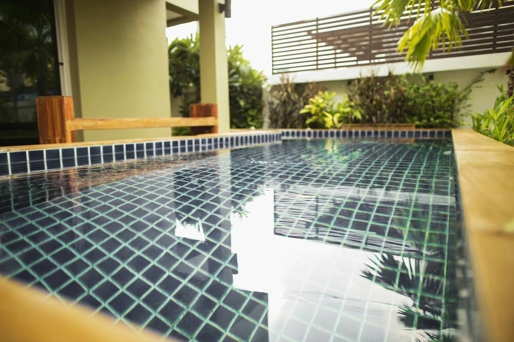 The Suvarnabhumi Apartment - Tap to explore photos