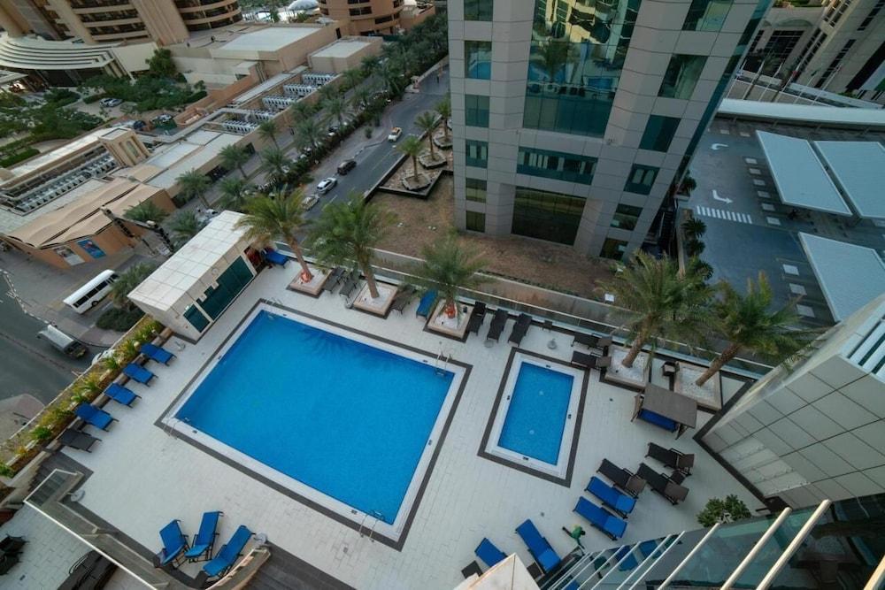 Nasma Luxury Stays - Botanica Tower - Tap to explore photos