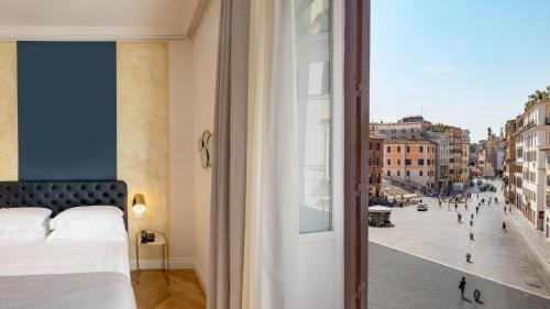 Spagna Luxury Rooms - Tap to explore photos