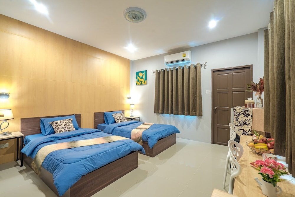 Penyos Residence Room Type - Deluxe Twin Room with Balcony