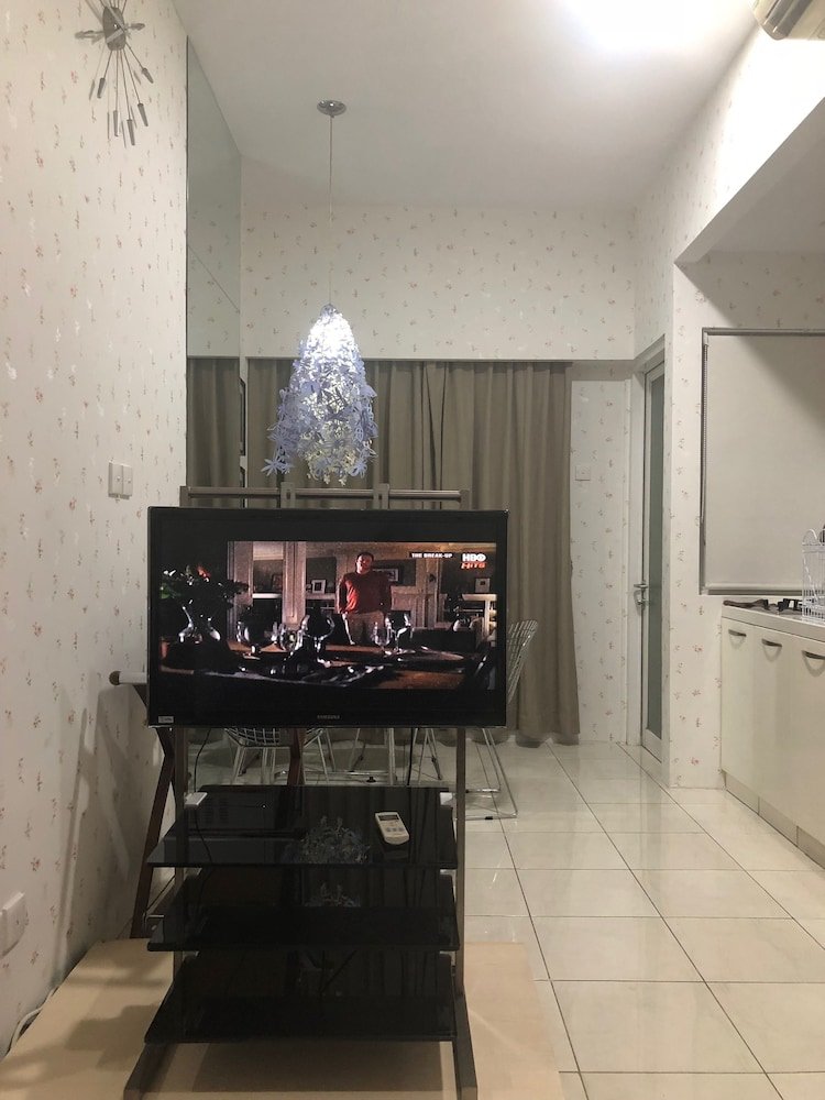 Sudirman Park Apartment by Merry - Tap to explore photos