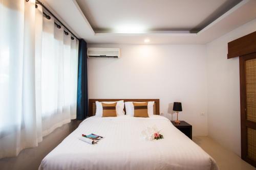 Adarin Beach Resort - Tap to explore photos