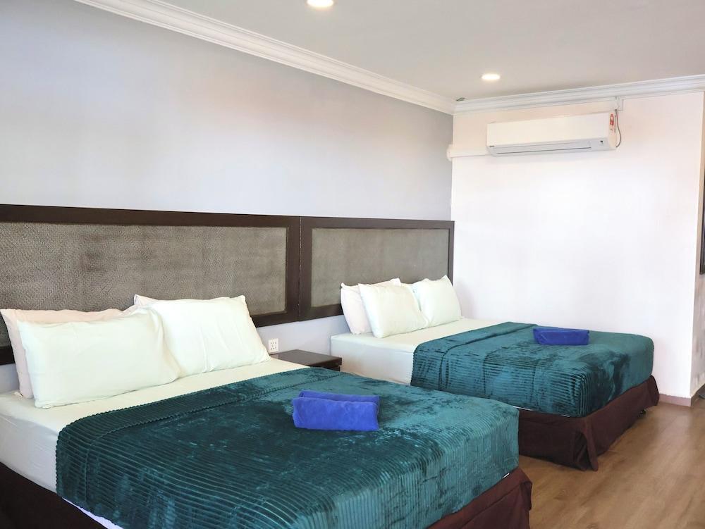 Shell Out Cenang Beach Resort Room Type - Family Room