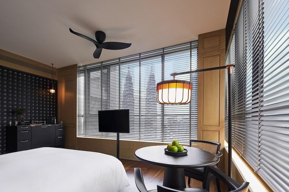 The RuMa Hotel and Residences Room Type - Corner Studio Twin Tower View